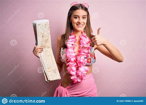 Young Beautiful Woman On Vacation Wearing Bikini And Hawaiian Lei