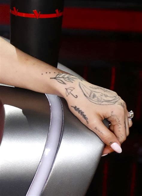 Ariana Grandes Tattoos and Their Meanings | PS Beauty