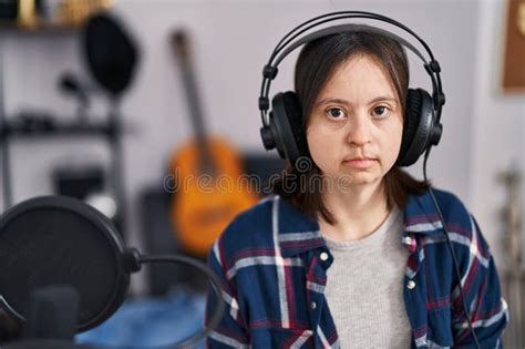 Young Woman with Down Syndrome Musician Listening To Music at Music Studio Stock Image - Image ...