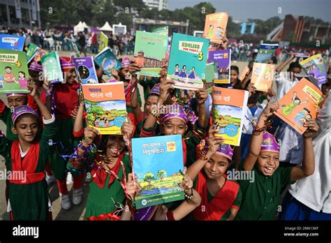 Dhaka, Bangladesh. 1st Jan 2023. Student celebrate with new textbooks