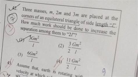 Three Masses M M And M Are Placed At The Corners Of An Equilateral