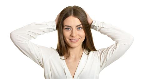 Premium Photo Portrait Of Brunette Woman Holding Head In Hands Isolated