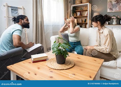 Stressed African American Male Psychologist And Angry Lgbt Lesbian Couple Fighting During