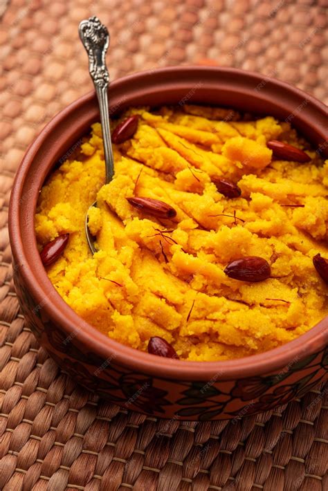 Premium Photo Badam Halwa Or Sheera Also Known As Almond Halwa Is A