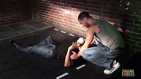 A Gorgeous Brunette And Her Blonde Milf Friend Are Getting Hammered In A Foursome On A Parking