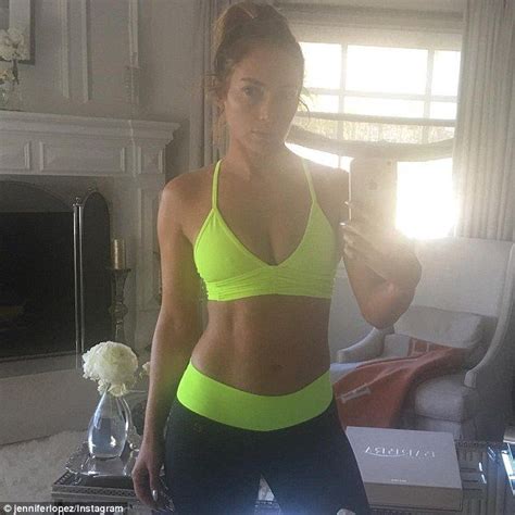 Jennifer Lopez Displays Her Ample Assets And Toned Torso In Bralet