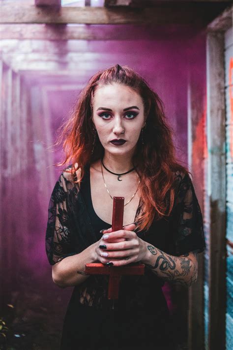 Spooky woman with makeup of spells · Free Stock Photo