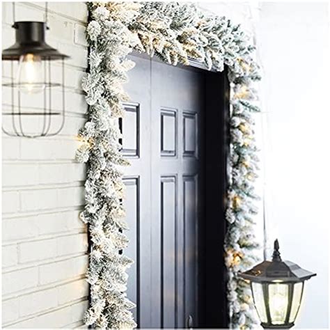 Amazon Glitzhome 2PK 9ft Pre Lit Snow Flocked Christmas Garlands