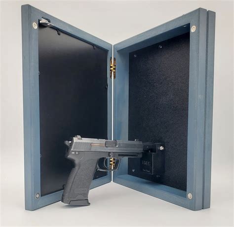 The Equalizer Hidden Gun Storage Picture Frame Secure Gun Safe And