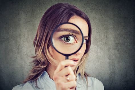 Woman Magnifying Glass Stock Photos Pictures And Royalty Free Images