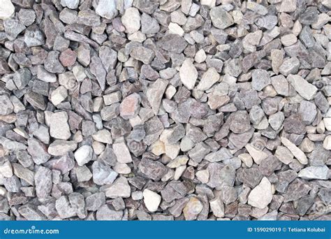 View Of Rubbles Beside Brick Houses At An Impoverished Area Stock Photo