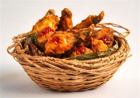 Premium Photo Marinade Fried Chicken Wings In Basket On A White