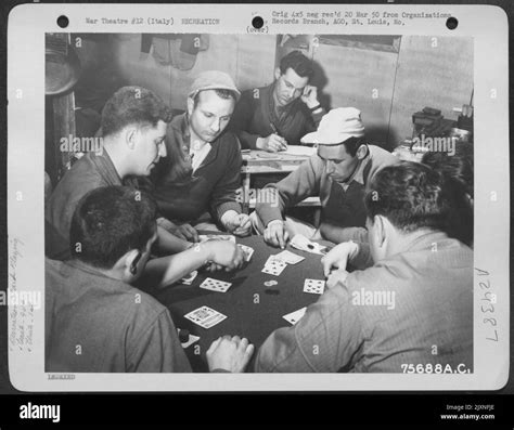 Men Of The 94th Fighter Squadron 1st Fighter Group Enjoy A Game Of Cards In Their Quarters At