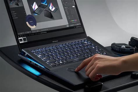 ASUS представила ноутбук с подымающейся клавиатурой и сенсорным колесом ...
