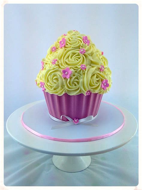 Pink Shelled Giant Cupcake With White Buttercream Roses And Pink