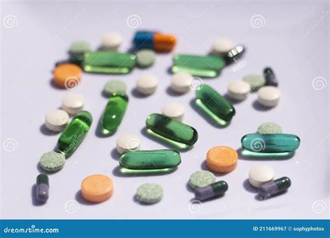 Assorted Colorful Tablets Pills Drugs On White Background Stock