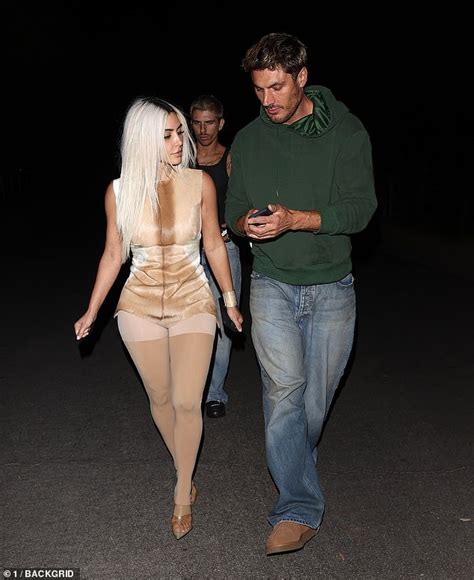 Kim Kardashian Shows Off Her Eye Popping Curves In A Racy Illusion Dress And Bizarre Nude