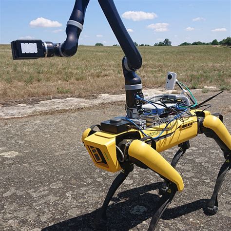 The Spot Quadruped Robot Mounted With Extra Payload The Controller