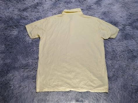 Uniqlo Plain Light Yellow Polo Shirt On Carousell