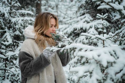 Cute Blonde On A Photo Shoot In The Prison Stays Behind Bars Stock