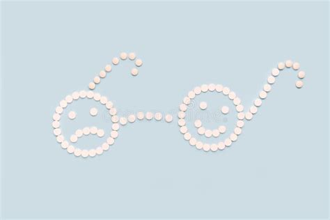 A Sad and a Happy Face Made of Pills. the Concept of Antidepressants ... 