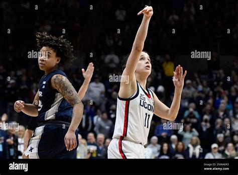 Uconn S Lou Lopez Senechal Watches Her Shot With Xavier S Aanaya Harris