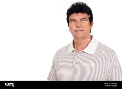 Portrait Of Mature Handsome Man Looking At Camera Stock Photo Alamy