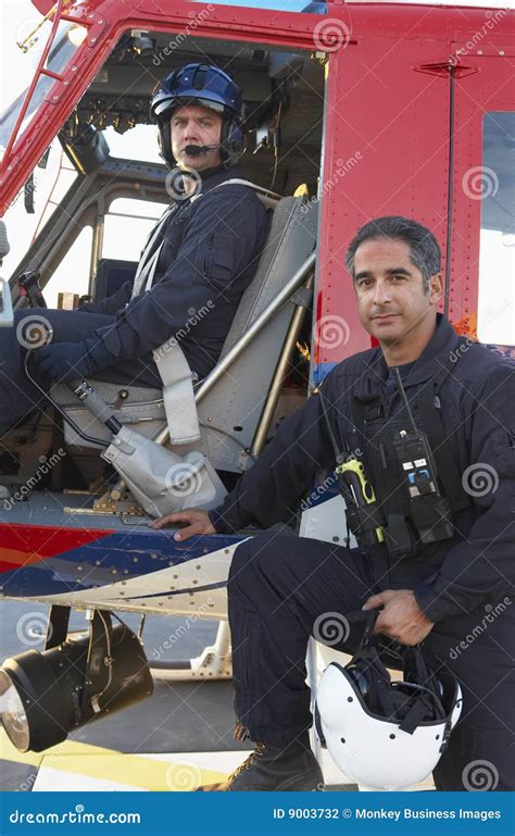 Portrait of Pilot and Paramedic by Medevac Stock Photo - Image of ...