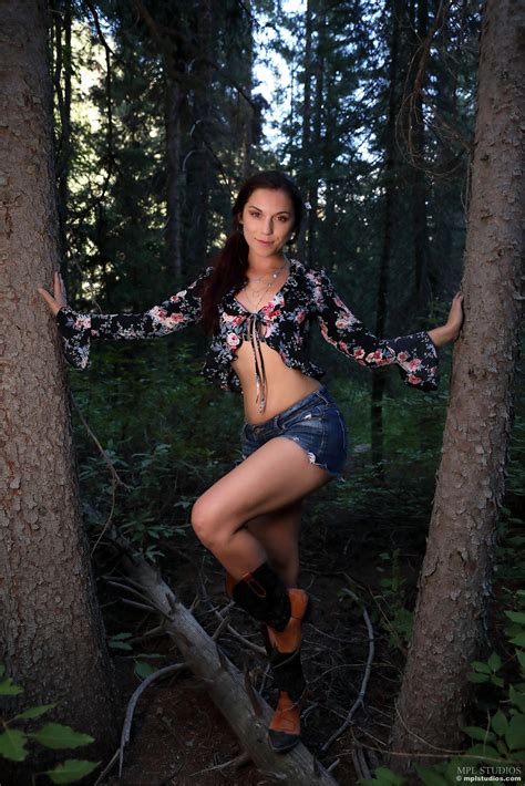 Elena Generi Shows Her Hairy Pussy In The Forest Photos