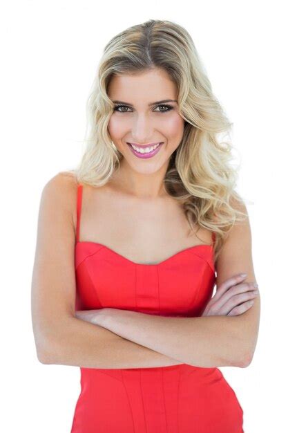 Premium Photo Smiling Blonde Model Posing With Arms Crossed