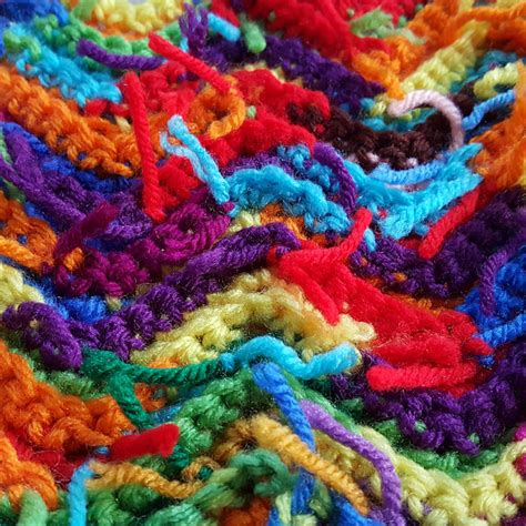 The scrap yarn crochet ripple blanket continues - Crochetbug