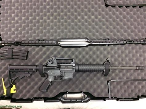 Gunlistings.org - Rifles Bushmaster XM15-E2S And Case