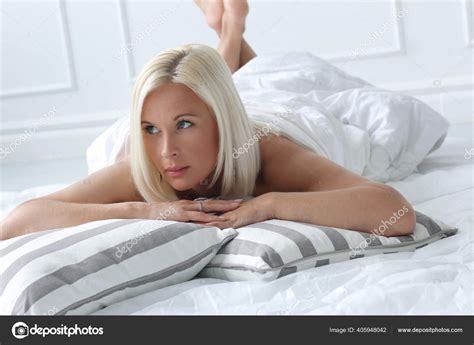 Sexy Blonde Woman Lying Bed Home Stock Photo By Racool Studio