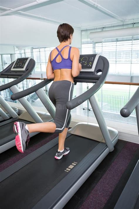 Fit Brunette Running On The Treadmill Stock Image Image Of Indoors Leisure