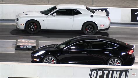 Tesla Model 3 And Y Drag A Couple Of Dodge Challenger Hellcats Someone