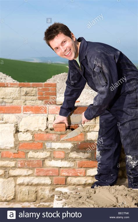 Man Bricklaying Wall With Trowel Stock Photo Royalty Free Image