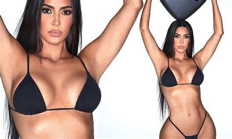 Kim Kardashian Shows Off Her Incredible Curves And Trim Tummy In A Skimpy Black Lingerie Set