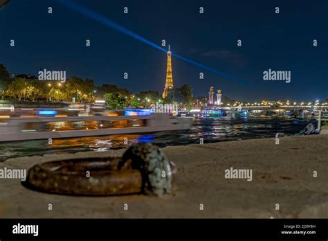 Tourists View of Boat Cruises in Paris at Night With Eiffel Tower Stock Photo - Alamy