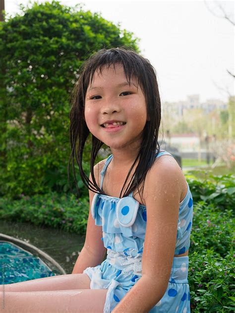 "Little Asian Girl Wearing Casual Swimsuit" by Stocksy Contributor ...