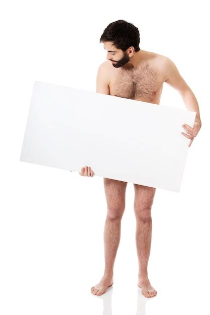 Premium Photo Naked Man Holding Blank Placard Against White Background