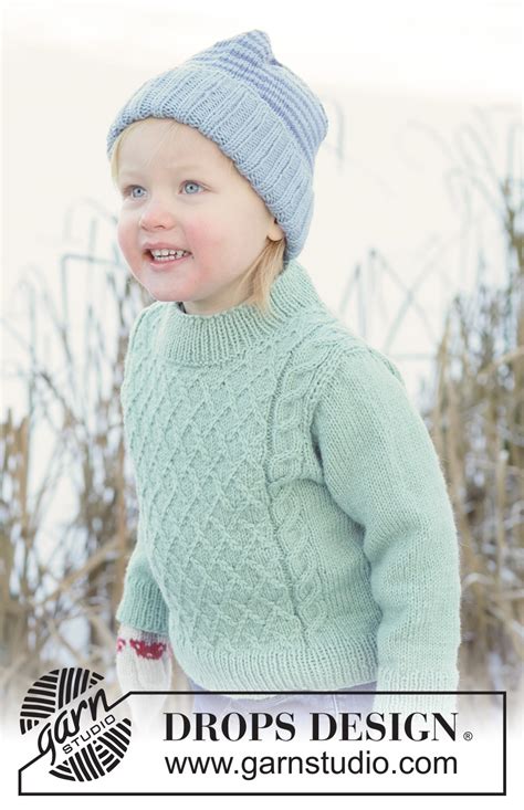 Chilly Charm Sweater / DROPS Children 50-16 - Modelos de tricô