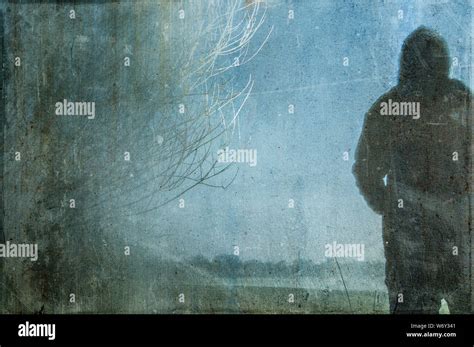 Hooded figure silhouette hi-res stock photography and images - Alamy