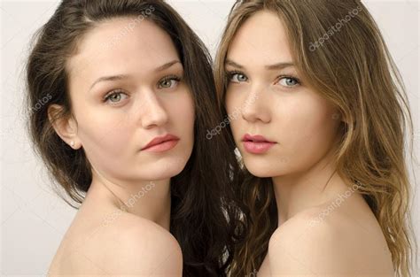 Two Beautiful Women One Brunette And One Blonde Posing Fashion Stock Photo By Iulianvalentin