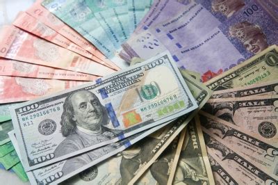 Ringgit closes lower than US dollar, but higher against Singapore ...