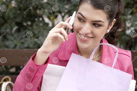 Woman Talking On Cell Phone Outdoors Stock Image Image Of Earrings