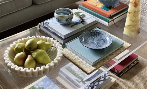 How To Arrange And Style Coffee Table Books According To Designers