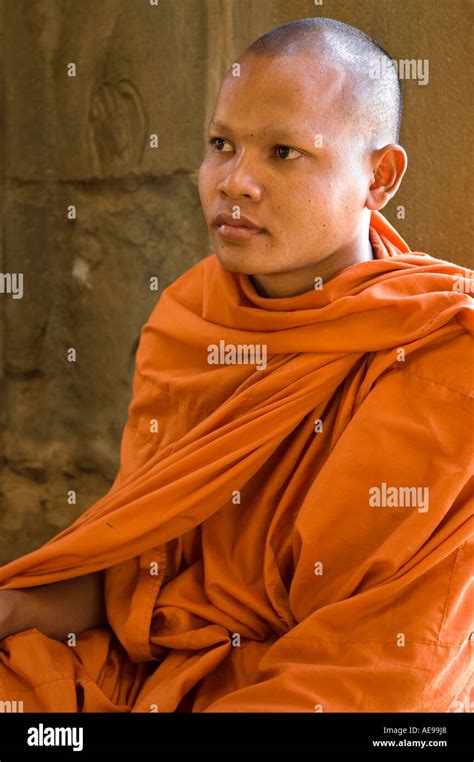 Stock Photo Of A Novice Monk At The Ancient Temple Of Angkor Wat In