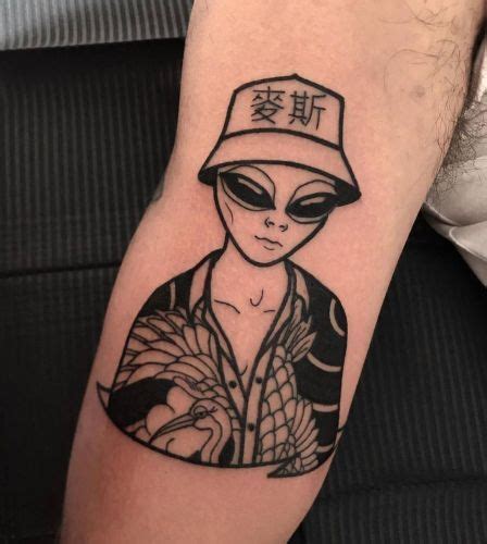 15 Best Alien Tattoo Designs And Ideas Alien Tattoo Tattoo Designs Small Tattoos For Guys