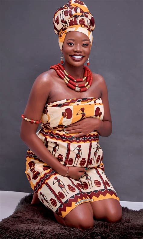 Woman in Traditional African Clothes and TurbanFree Stock Photo