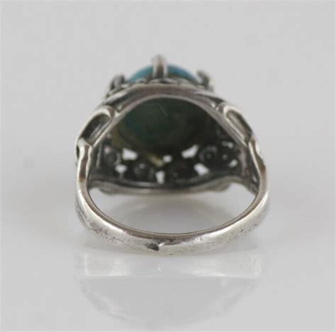 S Ornate Blue Stone And Sterling Silver Claw Sett Gem